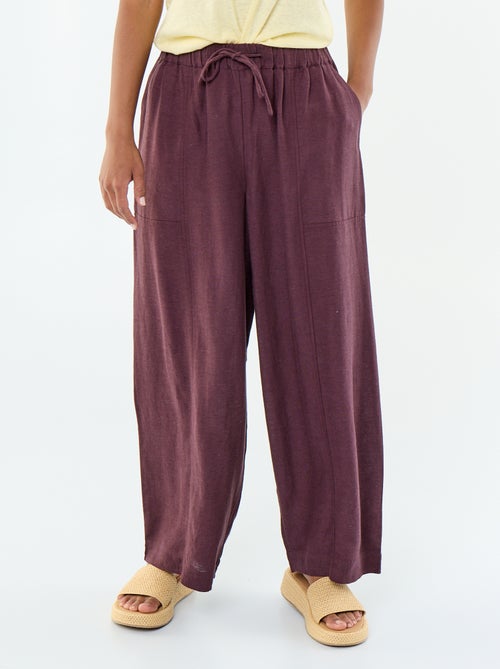 Pantalon femme en tissu léger à coupe large et taille haute - Kiabi Pantalon femme en tissu léger à coupe large et taille haute - Kiabi