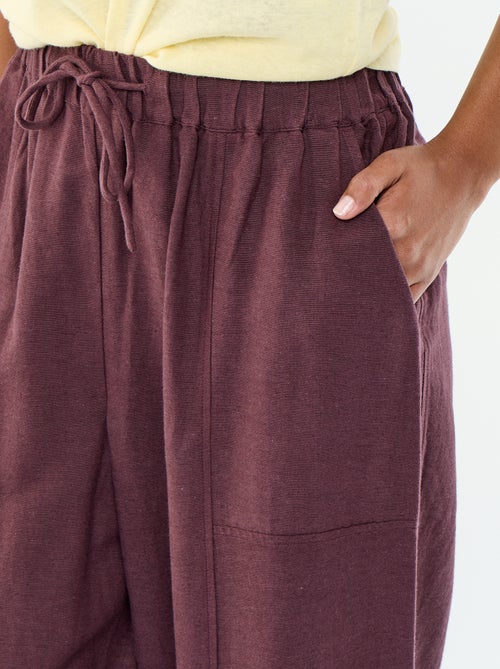 Pantalon femme en tissu léger à coupe large et taille haute - Kiabi Pantalon femme en tissu léger à coupe large et taille haute - Kiabi