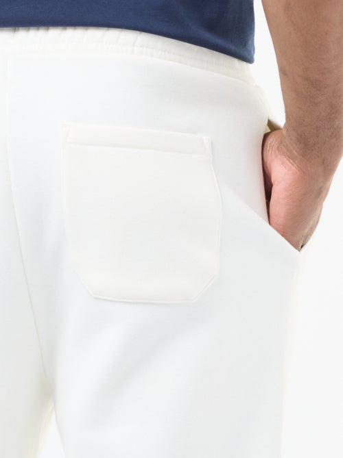 Pantalon jogging uni avec cordons de serrage à la taille - Kiabi