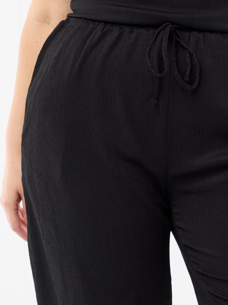 Pantalon large en maille crêpée Noir - Kiabi