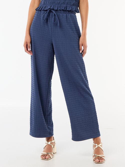 Pantalon large en maille smockée - Kiabi