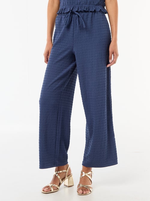 Pantalon large en maille smockée - Kiabi