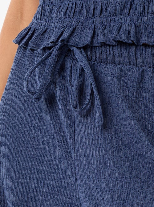 Pantalon large en maille smockée - Kiabi