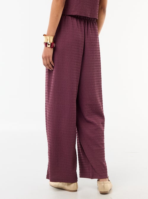 Pantalon large en maille smockée - Kiabi