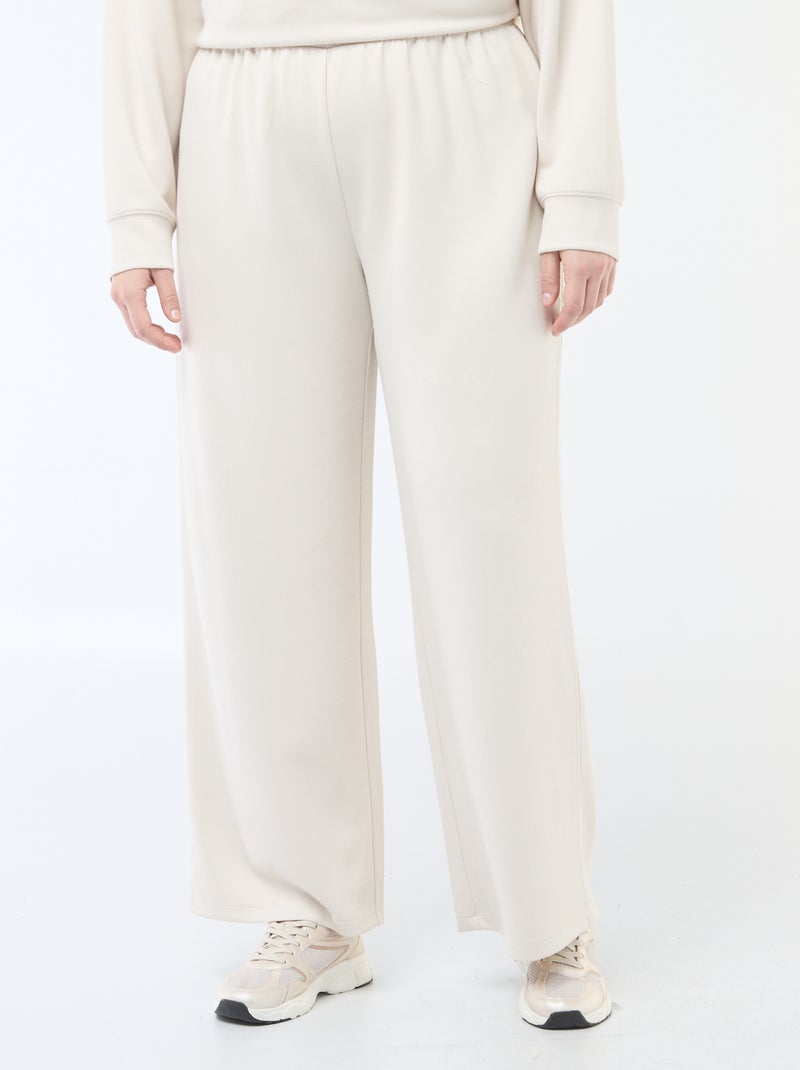 Pantalon large en matière stretch côtelée Beige - Kiabi