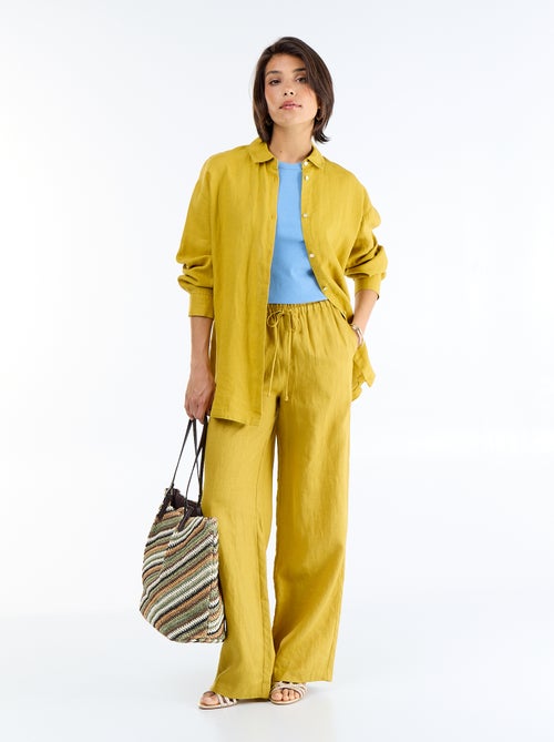 Pantalon large pour femme à taille élastiquée - Kiabi Pantalon large pour femme à taille élastiquée - Kiabi