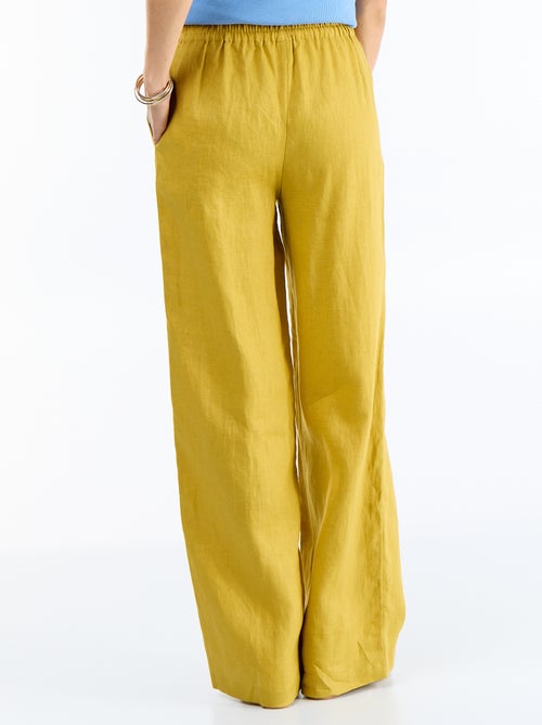 Pantalon large pour femme à taille élastiquée - Kiabi Pantalon large pour femme à taille élastiquée - Kiabi