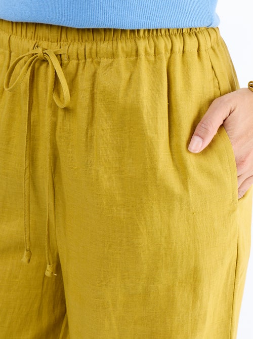 Pantalon large pour femme à taille élastiquée - Kiabi Pantalon large pour femme à taille élastiquée - Kiabi