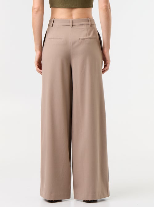 Pantalone ampio a vita alta con pinces - Kiabi Pantalone ampio a vita alta con pinces - Kiabi