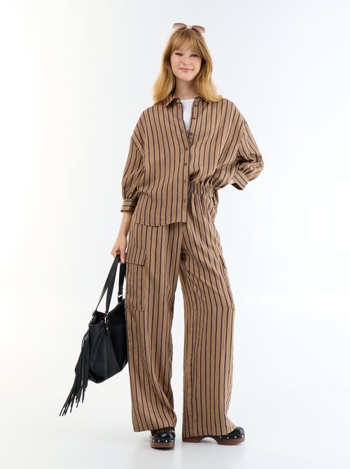Pantaloni ampi a righe con tasche a patta - Kiabi Pantaloni ampi a righe con tasche a patta - Kiabi