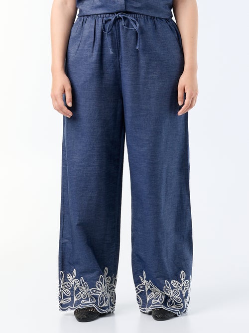 Pantaloni ampi con stampe ricamate - Kiabi Pantaloni ampi con stampe ricamate - Kiabi