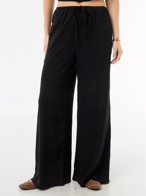 Pantaloni ampi crêpe con 2 tasche - Kiabi