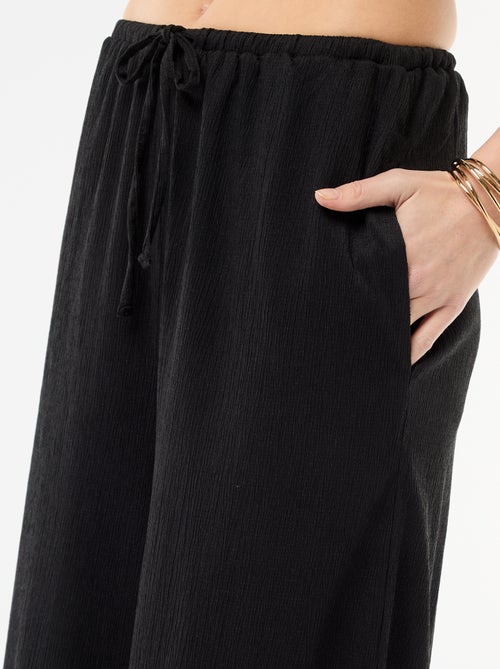 Pantaloni ampi crêpe con 2 tasche - Kiabi