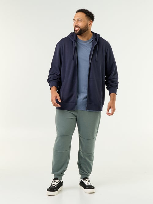 Pantaloni da jogging con fondo stretto e tasche con zip - Kiabi