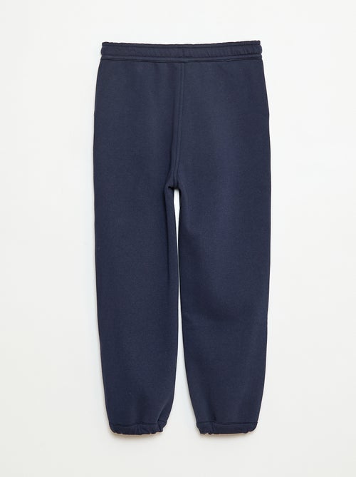 Pantaloni da jogging tinta unita con 2 tasche - Kiabi Pantaloni da jogging tinta unita con 2 tasche - Kiabi