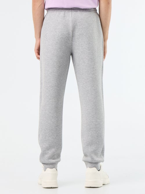 Pantaloni jogging con tasche con zip - Kiabi