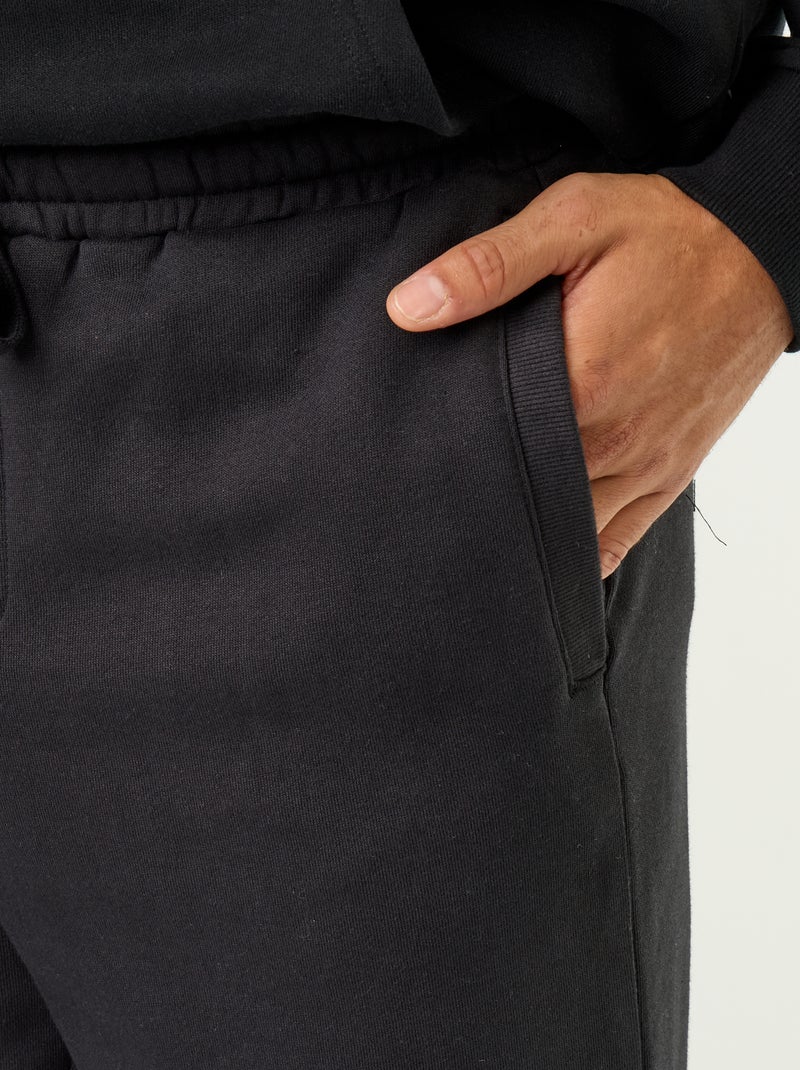Pantaloni jogging in felpa tinta unita Nero - Kiabi