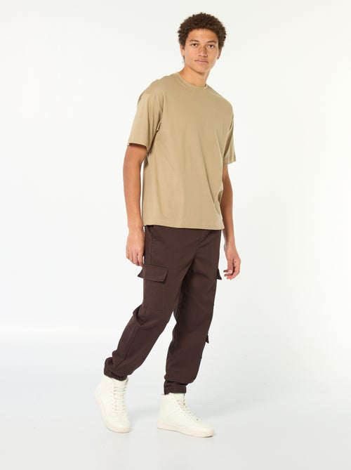 Pantaloni stile 'jogger' multitasche - Kiabi