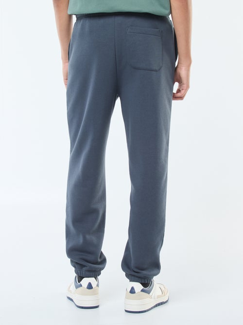 Plain joggers with drawstrings at the waist - Kiabi Plain joggers with drawstrings at the waist - Kiabi