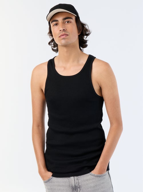 Plain vest top in ribbed knit fabric - Kiabi Plain vest top in ribbed knit fabric - Kiabi