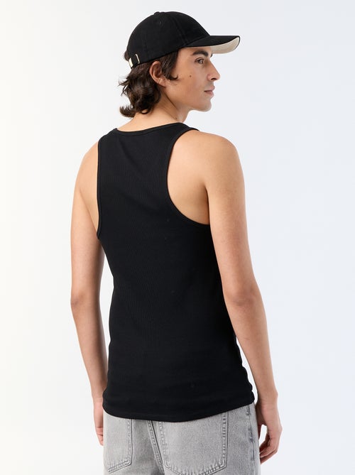 Plain vest top in ribbed knit fabric - Kiabi Plain vest top in ribbed knit fabric - Kiabi