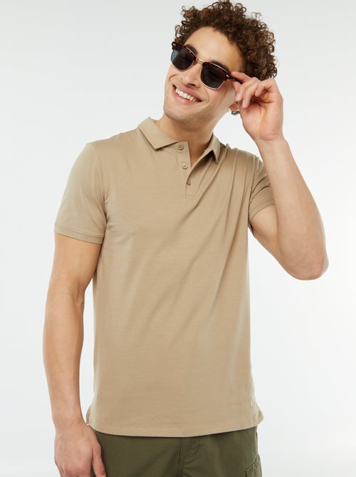Polo en jersey uni à manches courtes - Kiabi
