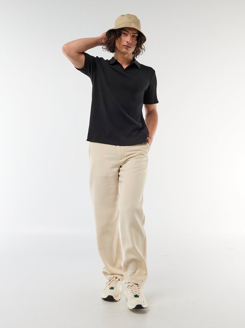 Polo en matière fantaisie ajourée Noir - Kiabi