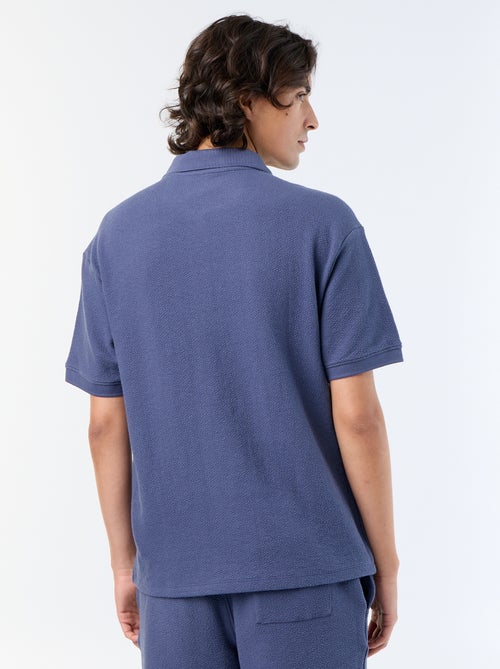 Polo homme en coton avec motif placé - Kiabi
