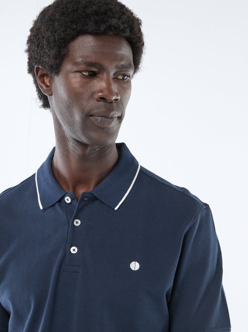 Polo Homme en coton uni à manches courtes - Kiabi Polo Homme en coton uni à manches courtes - Kiabi