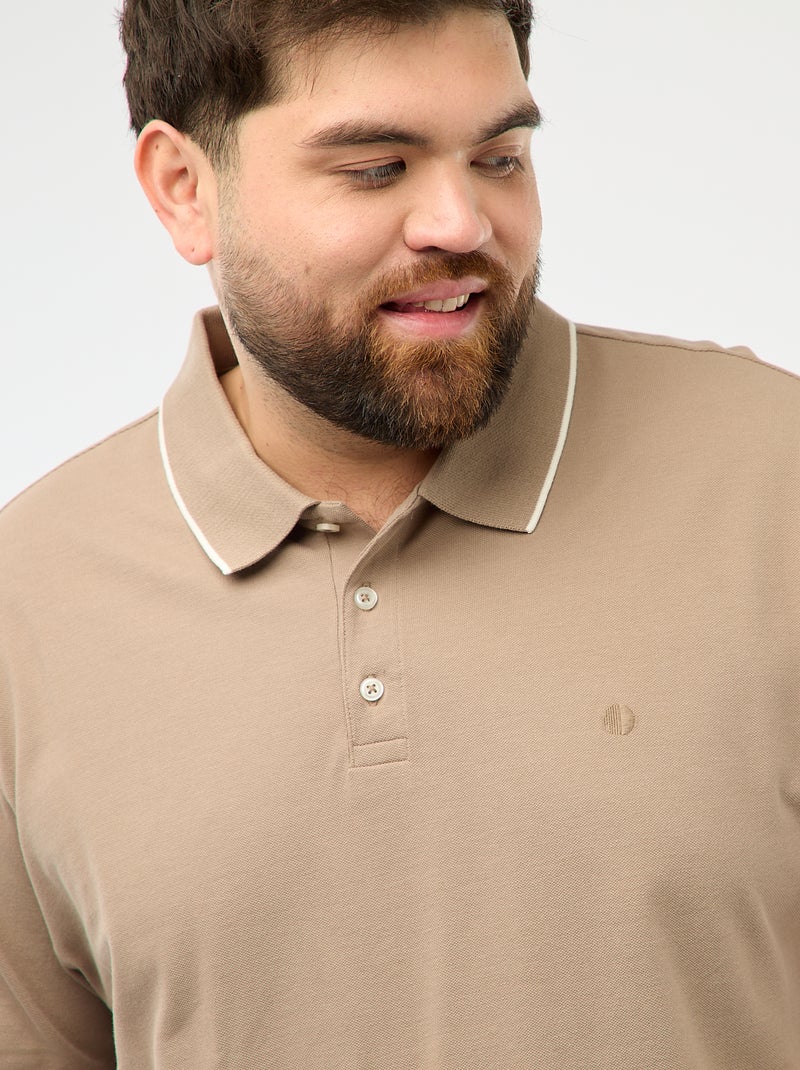 Polo in cotone a contrasto Beige - Kiabi