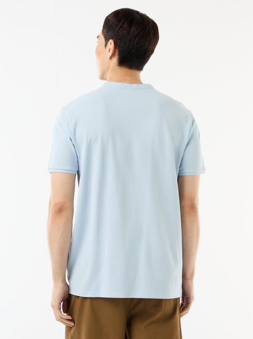Polo pour homme en maille piquée avec col tunisien - Kiabi Polo pour homme en maille piquée avec col tunisien - Kiabi
