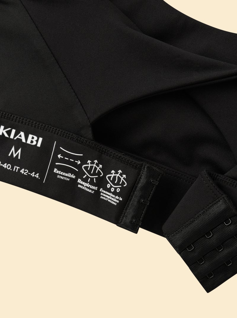 Reggiseno sportivo effetto twist sul retro, sostegno forte Nero - Kiabi