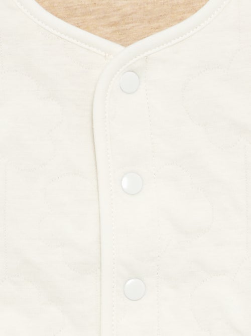 Reversible quilted snap-button jacket - Kiabi Reversible quilted snap-button jacket - Kiabi