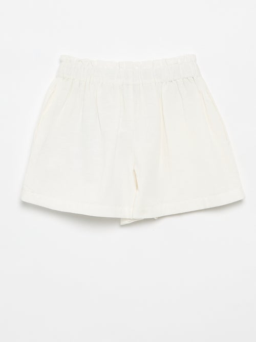 Short a tinta unita con fiocco decorativo - Kiabi Short a tinta unita con fiocco decorativo - Kiabi