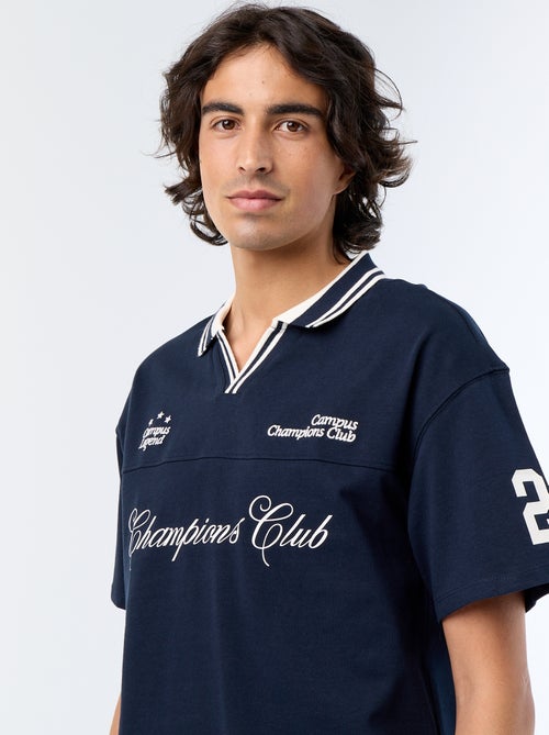 Short-sleeved polo shirt with embroidered lettering - Kiabi Short-sleeved polo shirt with embroidered lettering - Kiabi