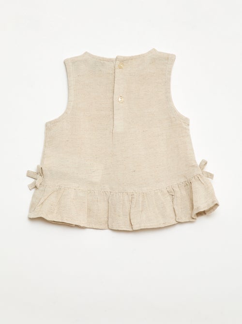 Sleeveless blouse with ruffles and bows - Kiabi