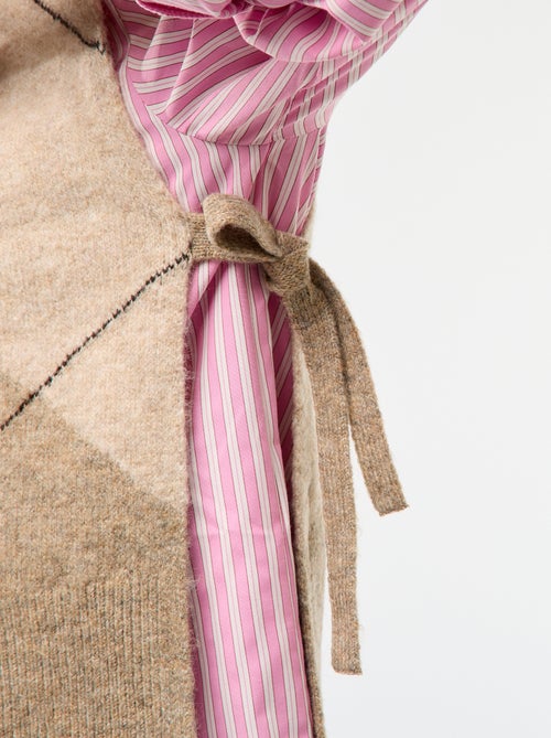 Sleeveless Sweater with Side Tie Details - Kiabi Sleeveless Sweater with Side Tie Details - Kiabi