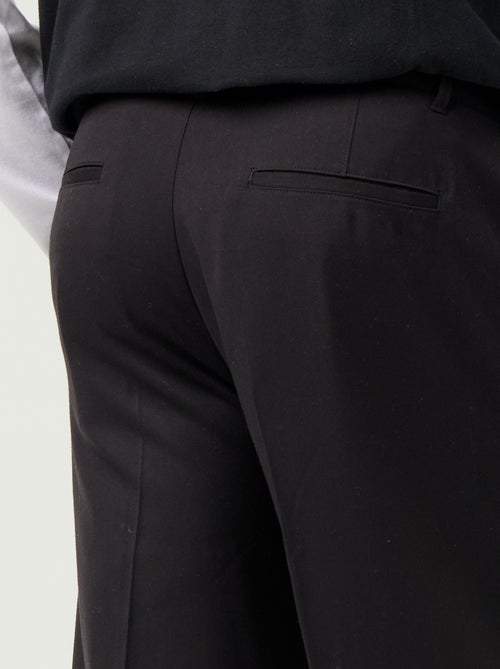 Solid wide-leg trousers - Kiabi Solid wide-leg trousers - Kiabi