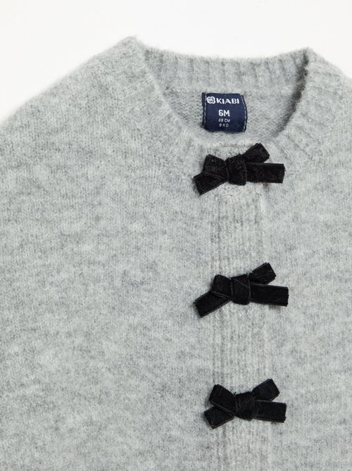 Strickcape mit Samtschleifen - Kiabi