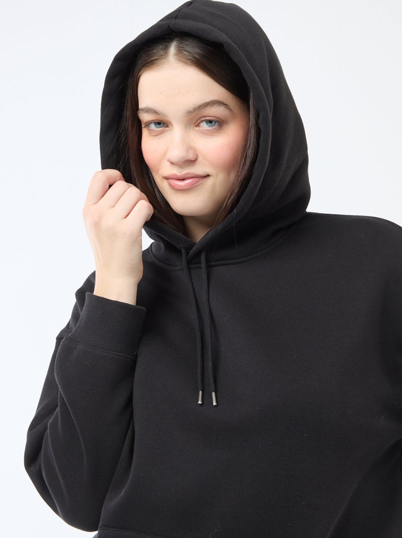 Sweat à capuche uni avec poche kangourou Noir - Kiabi