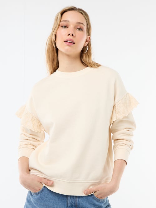 Sweat uni avec volants en borderies anglaises sur les manches - Kiabi