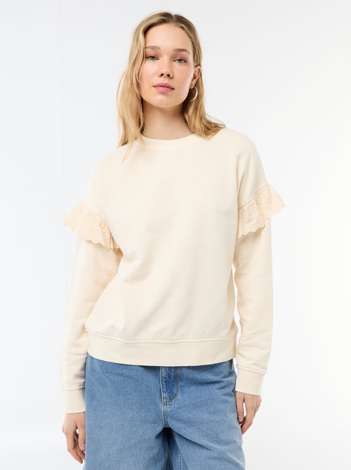 Sweat uni avec volants en borderies anglaises sur les manches - Kiabi