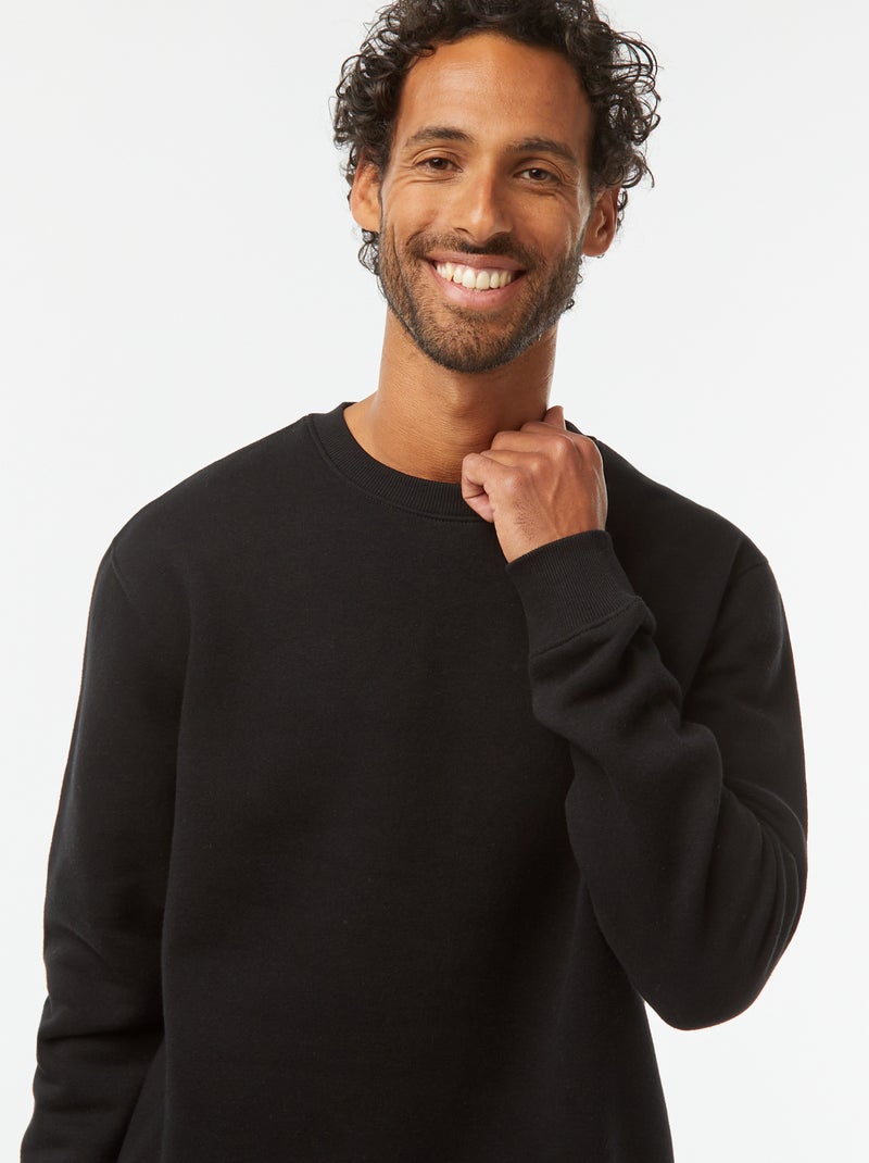 Sweat uni en molleton gratté à col rond Noir - Kiabi