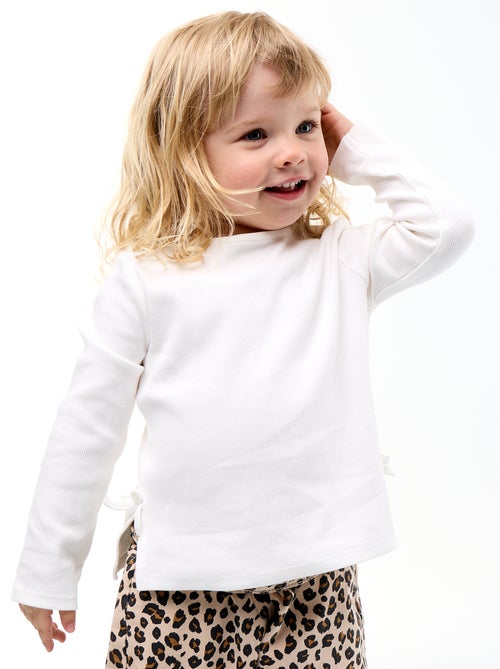 T-shirt a costine a maniche lunghe con fiocco - Kiabi T-shirt a costine a maniche lunghe con fiocco - Kiabi