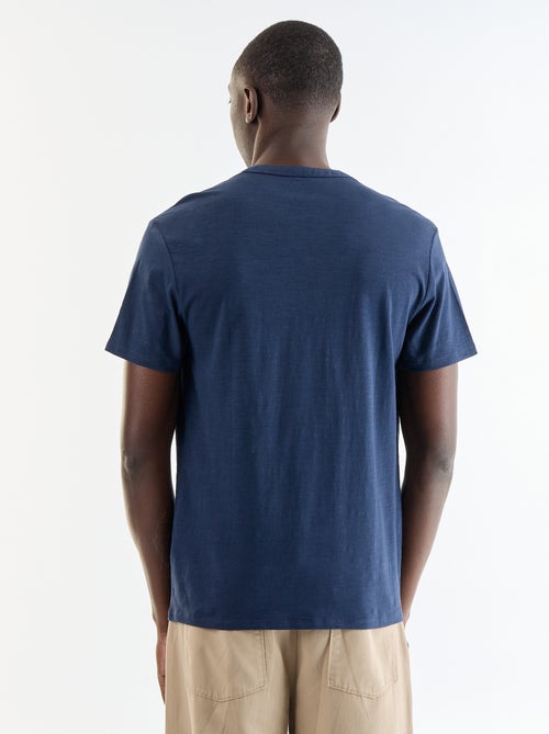 T-shirt a maniche corte con collo alla tunisina - Kiabi T-shirt a maniche corte con collo alla tunisina - Kiabi