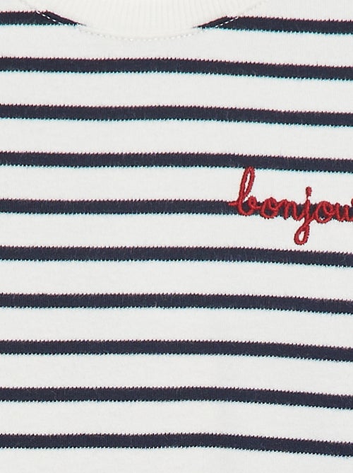 T-shirt a maniche lunghe con 'bonjour' ricamato sul petto - Kiabi T-shirt a maniche lunghe con 'bonjour' ricamato sul petto - Kiabi