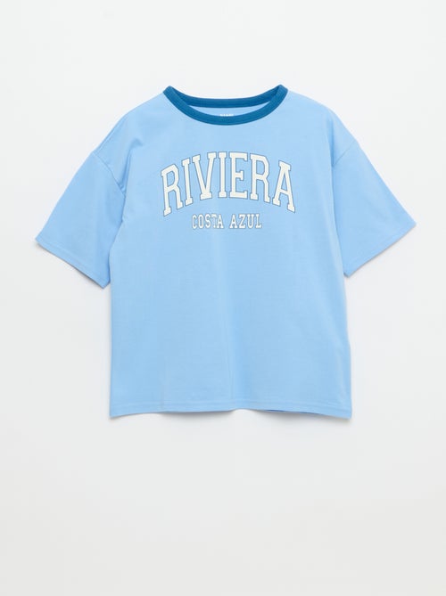 T-shirt con stampa fantasia a maniche corte con profili a contrasto - Kiabi T-shirt con stampa fantasia a maniche corte con profili a contrasto - Kiabi