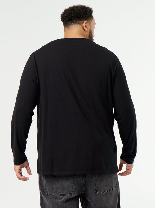 T-shirt in jersey a tinta unita a maniche lunghe - Kiabi T-shirt in jersey a tinta unita a maniche lunghe - Kiabi
