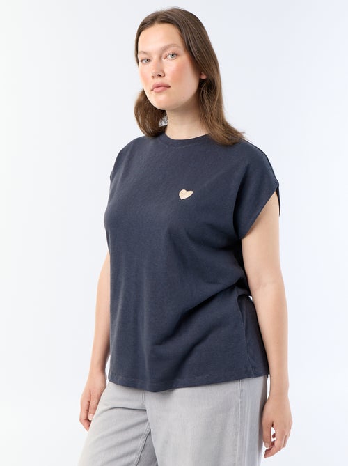 T-shirt in jersey senza maniche con piccolo ricamo sul petto - Kiabi