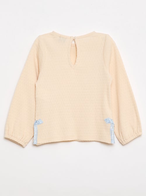 T-shirt in maglia a costine con fiocchi decorativi - Kiabi